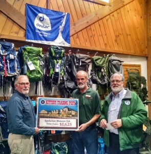 Photo by Derek Sturtevant showing Dave McCarthy, Steve Dowden, and Doug Chamberlin. Dave and Doug are AMC Maine Executive Committee members. Steve is a senior associate at KTP in the camping and specialty sports department.